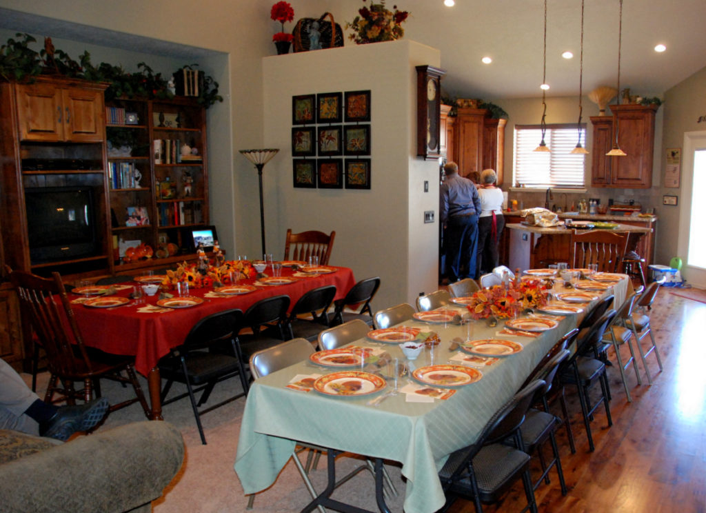 Big family Thanksgiving celebration with two tables
