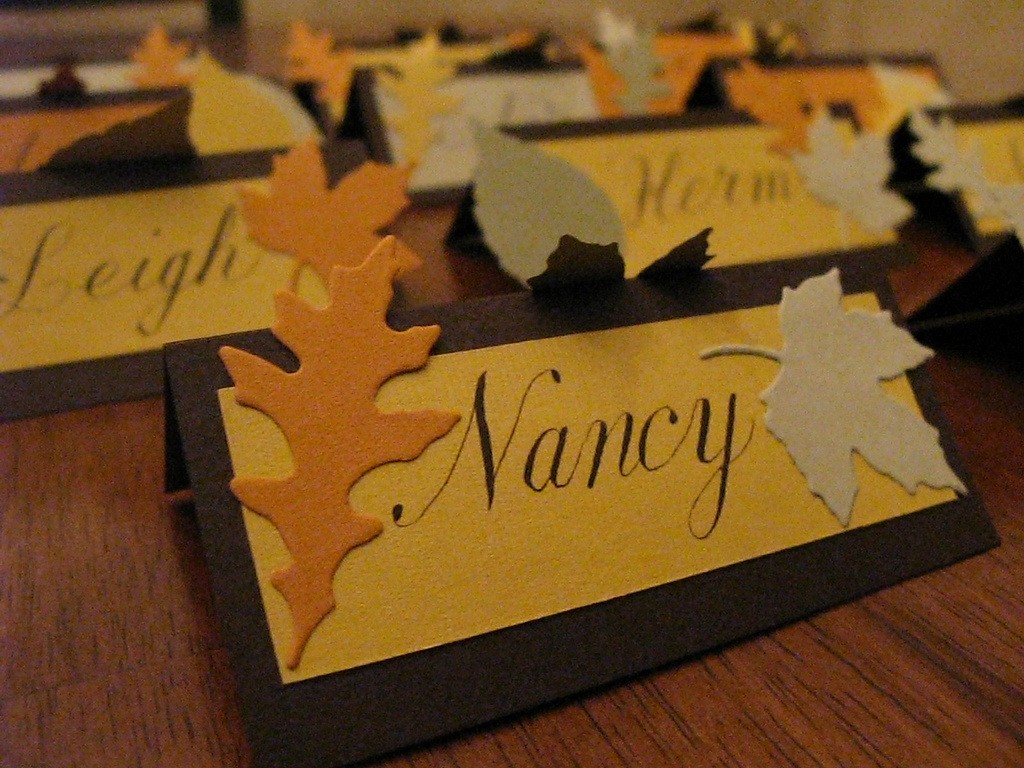 Scripty placecards with leaf cutouts