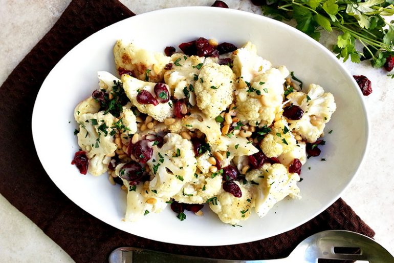 Roasted cauliflower recipe with dried cranberries and sherry vinaigrette | MakeItGrateful.com