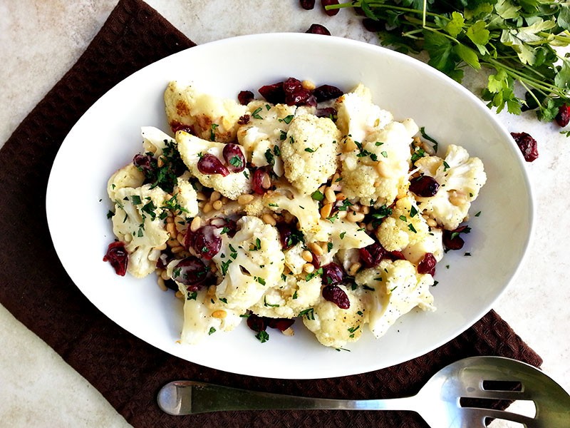 Roasted cauliflower recipe with dried cranberries and sherry vinaigrette | MakeItGrateful.com