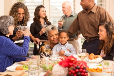 Family enjoying Thanksgiving | MakeItGrateful.com