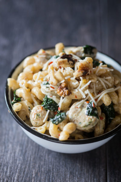 Creamy pasta with chicken sausage, spinach and walnuts