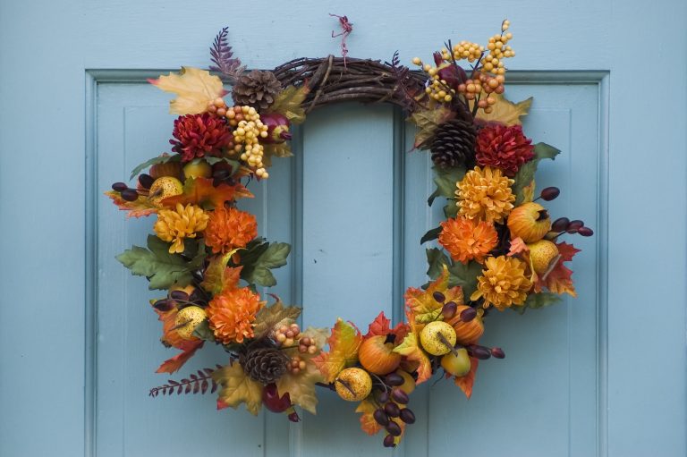 Thanksgiving wreath on a blue door