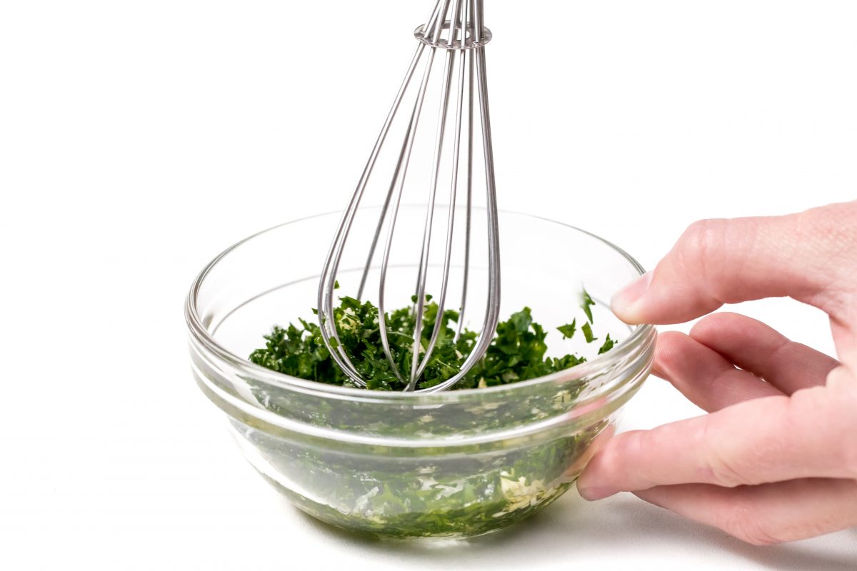 In small bowl, mix minced garlic, parsley, oil and salt