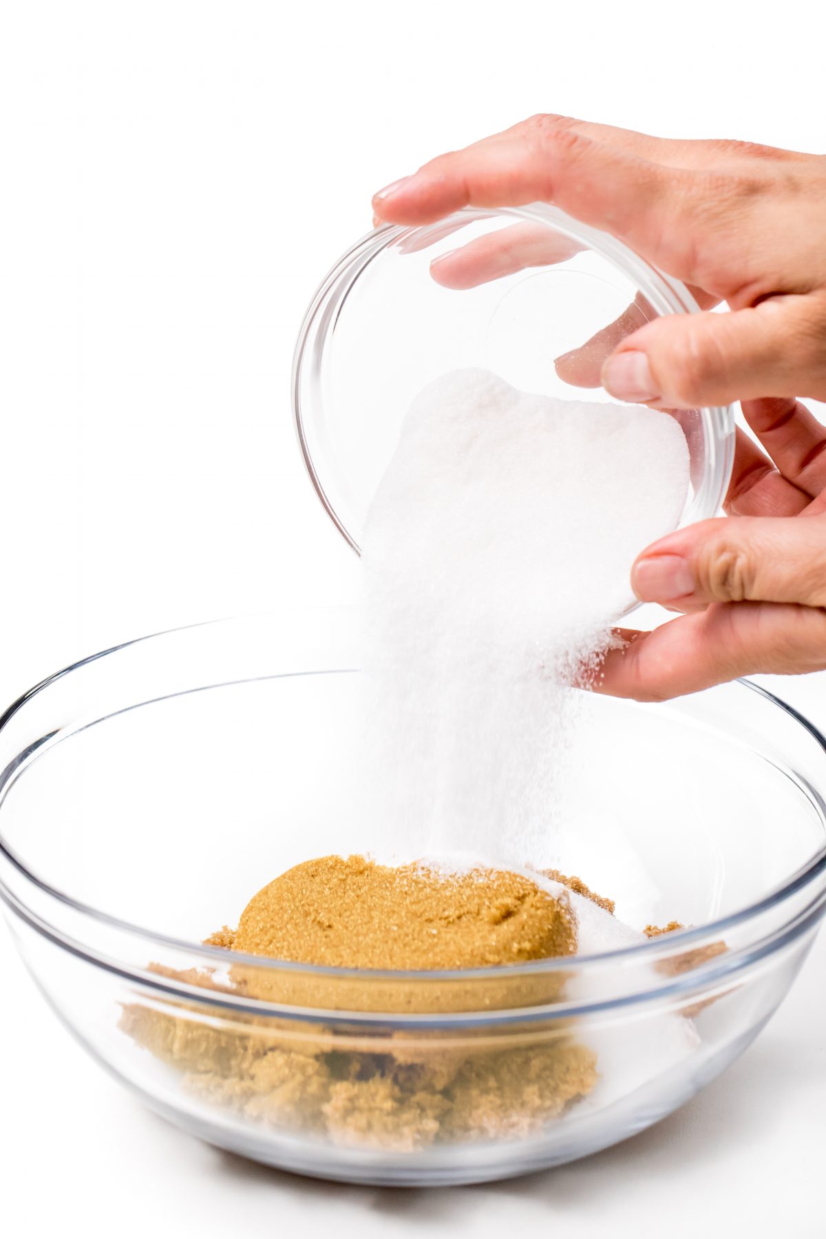 Chocolate sugar scrub - pouring granulated sugar into mixing bowl