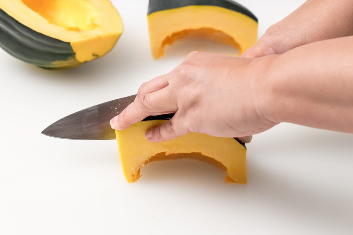Slice squash into sections for Roast squash, manchego and honey paprika dressing