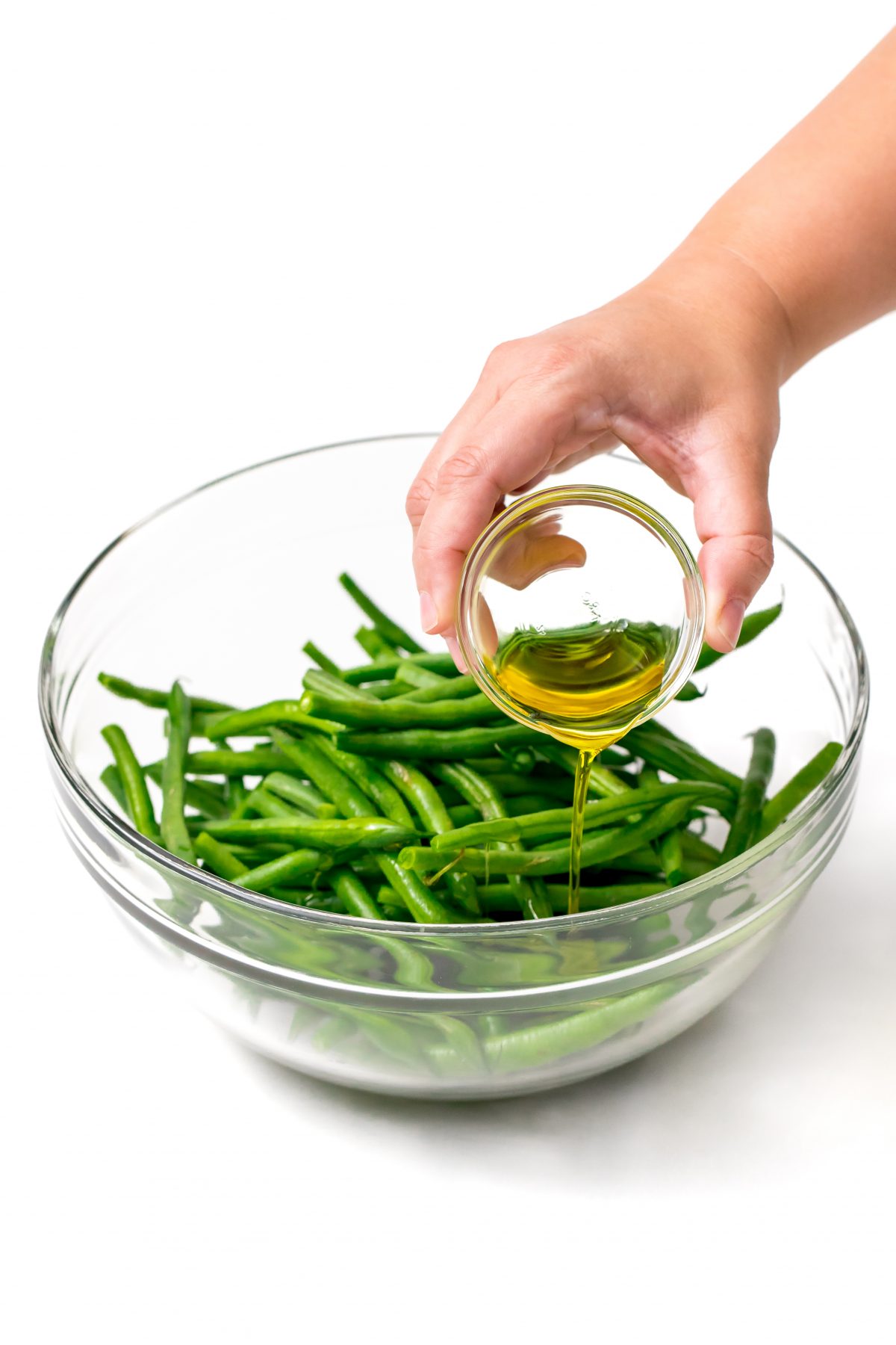 Drizzle olive oil and lemon juice over green beans