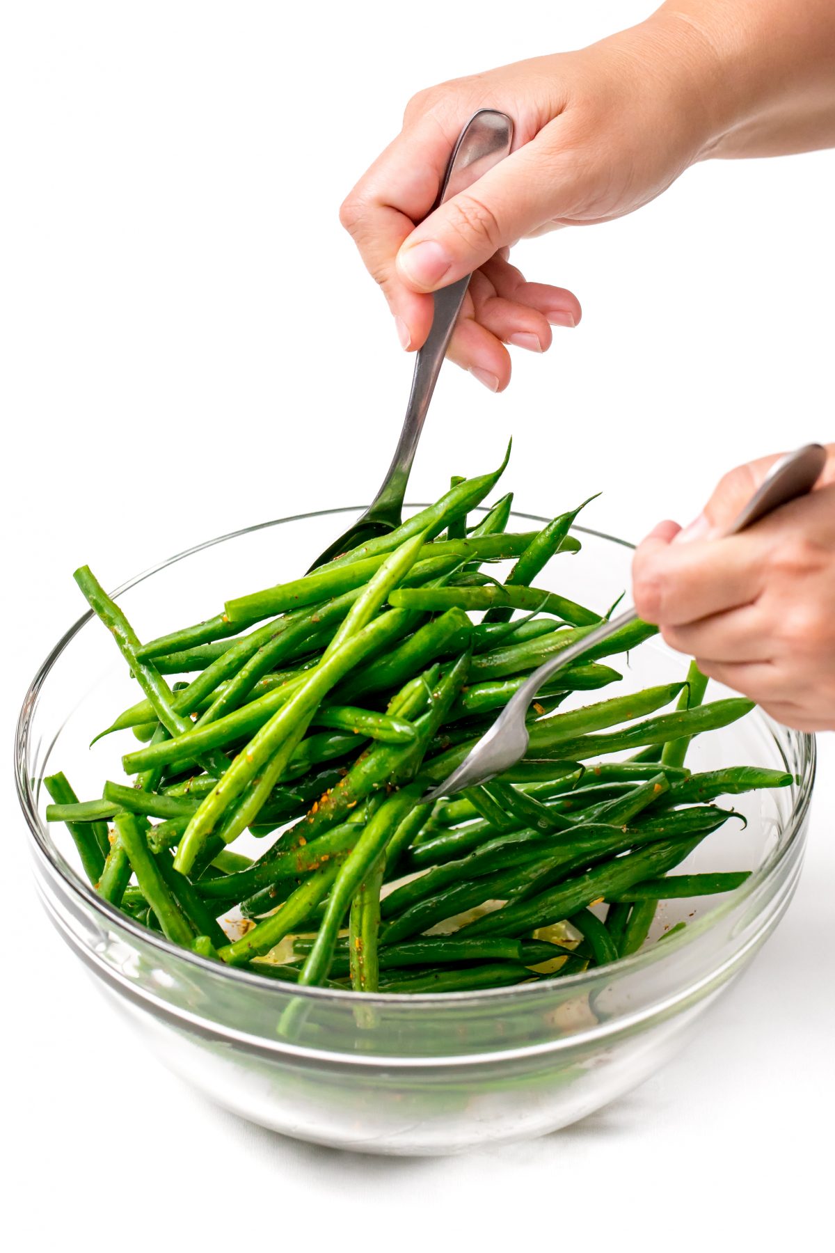 Toss green beans in bowl