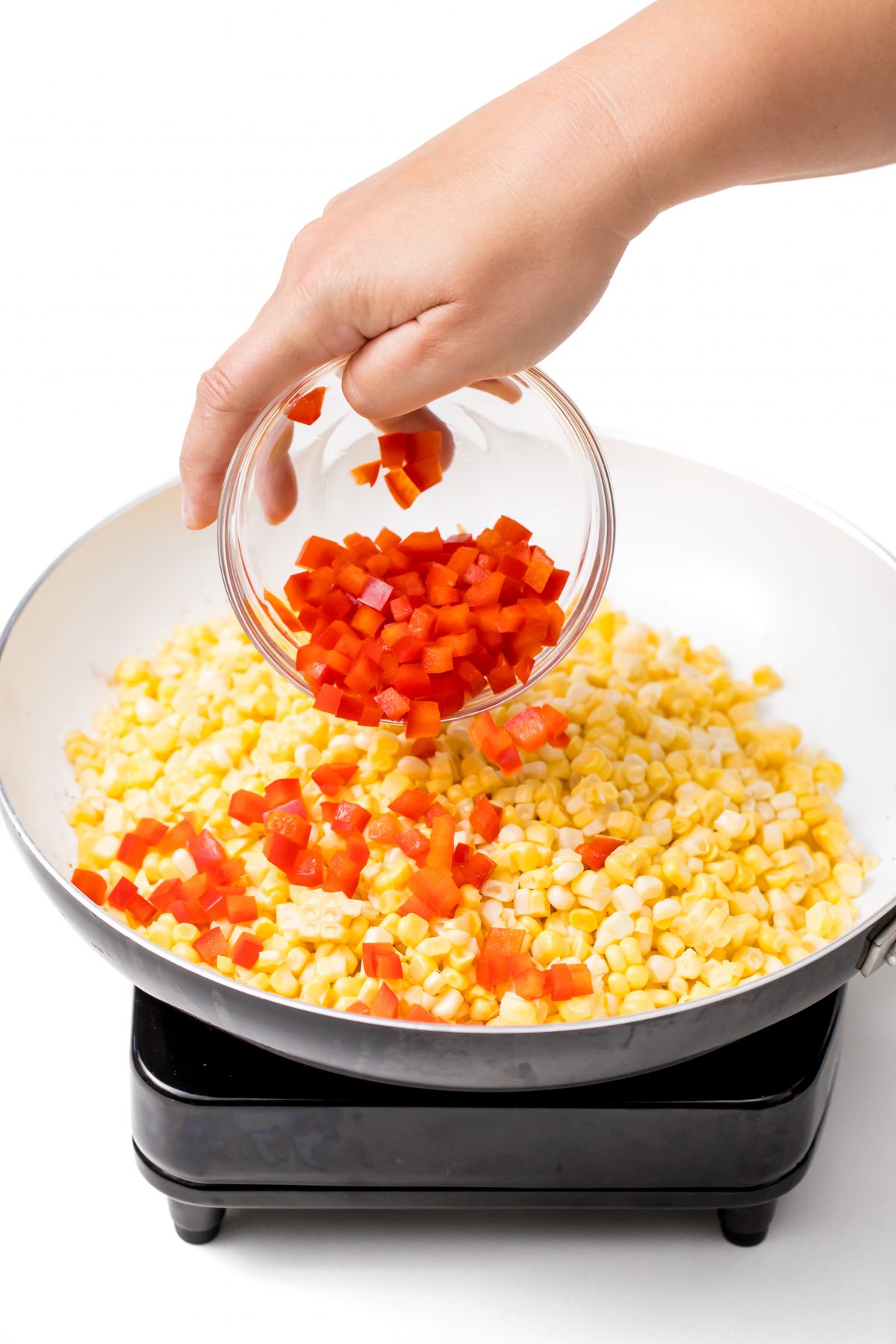 Sautee corn, and add red bell pepper