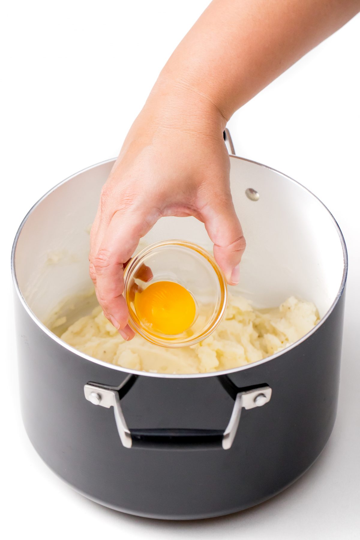 add egg yolk to potatoes