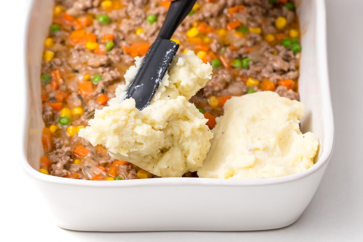mashed potatoes are added to casserole