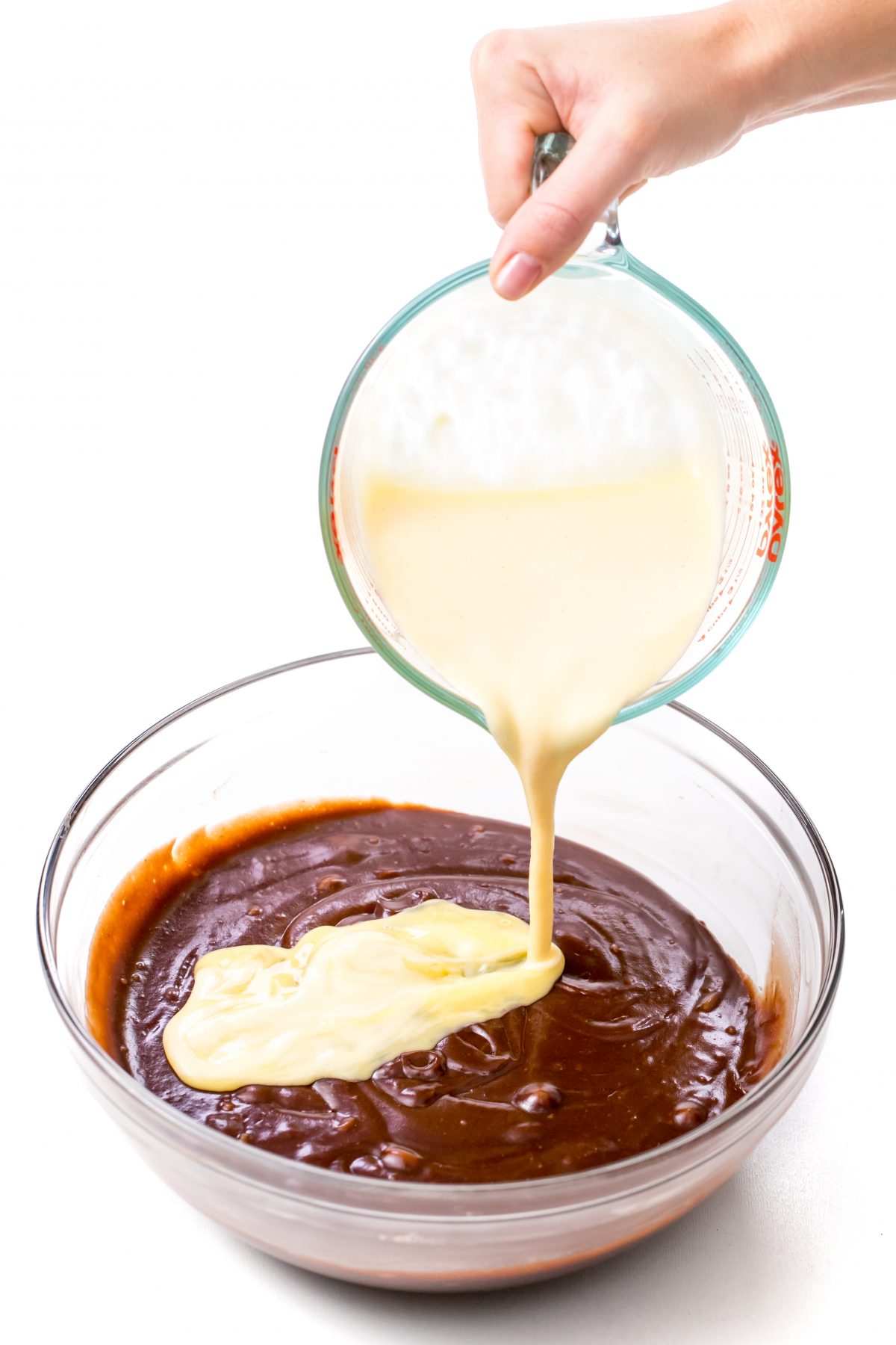 Combine contents of liquid measuring cup to cocoa mixture