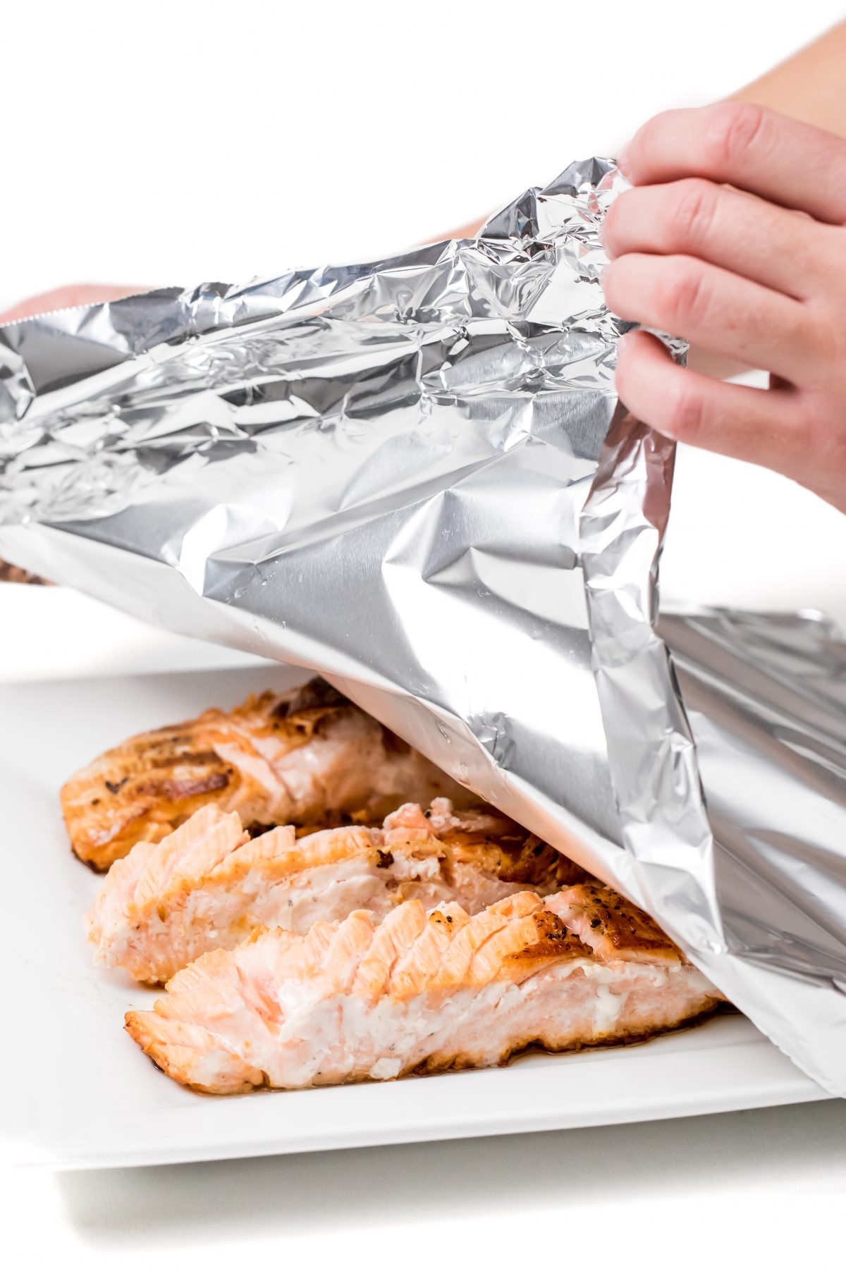 Remove salmon from pan and cover with foil
