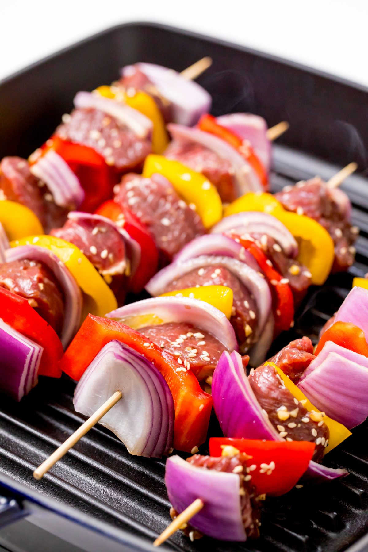 Allow kabobs to cook on the grill