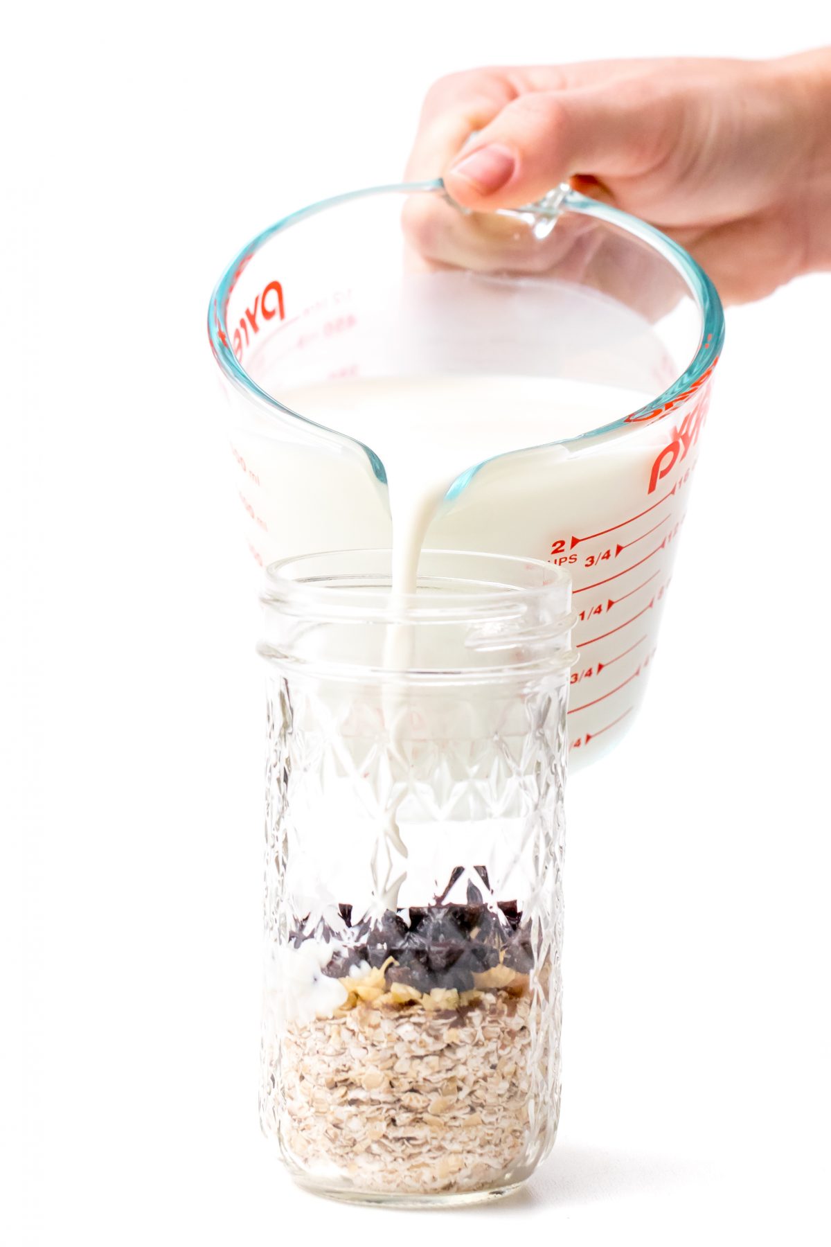 Pour milk into jars