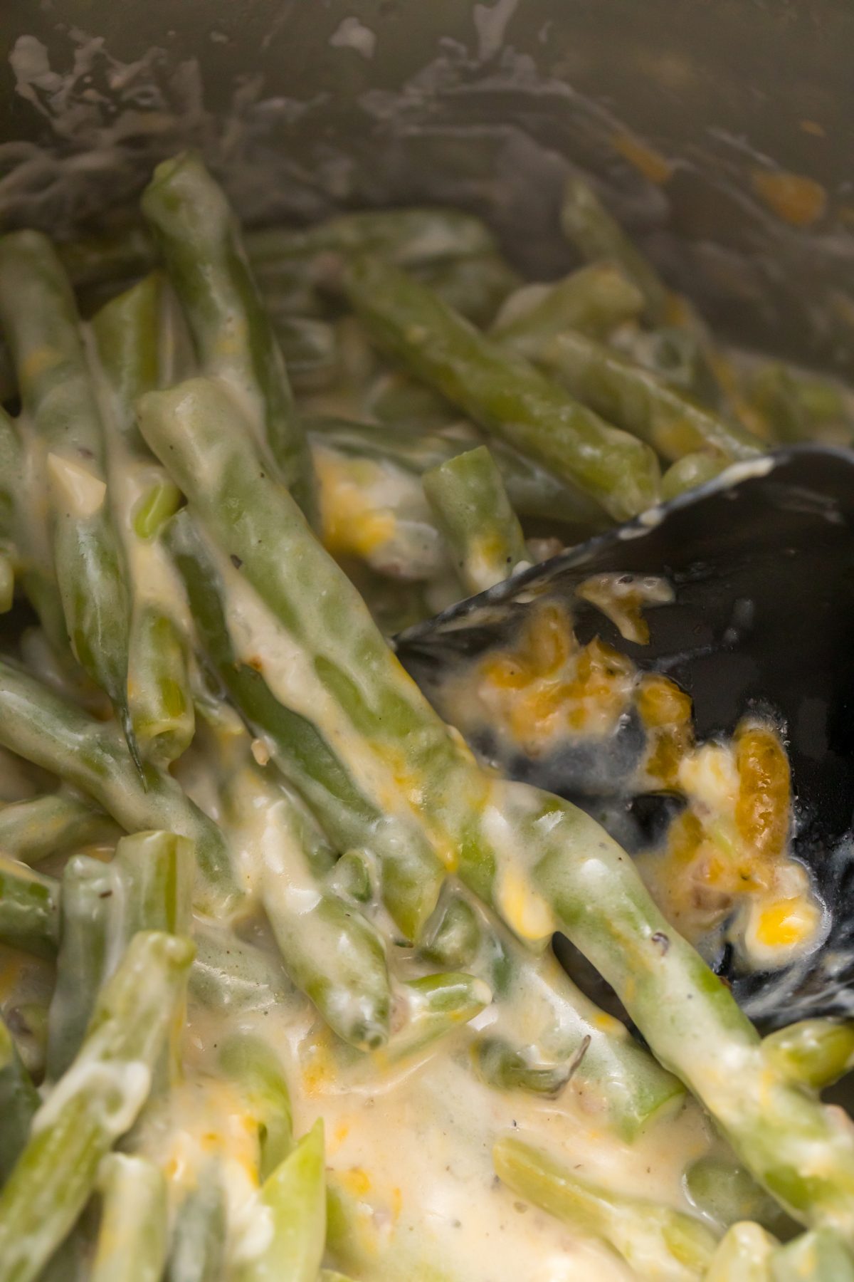 Stir the cheese into the green beans