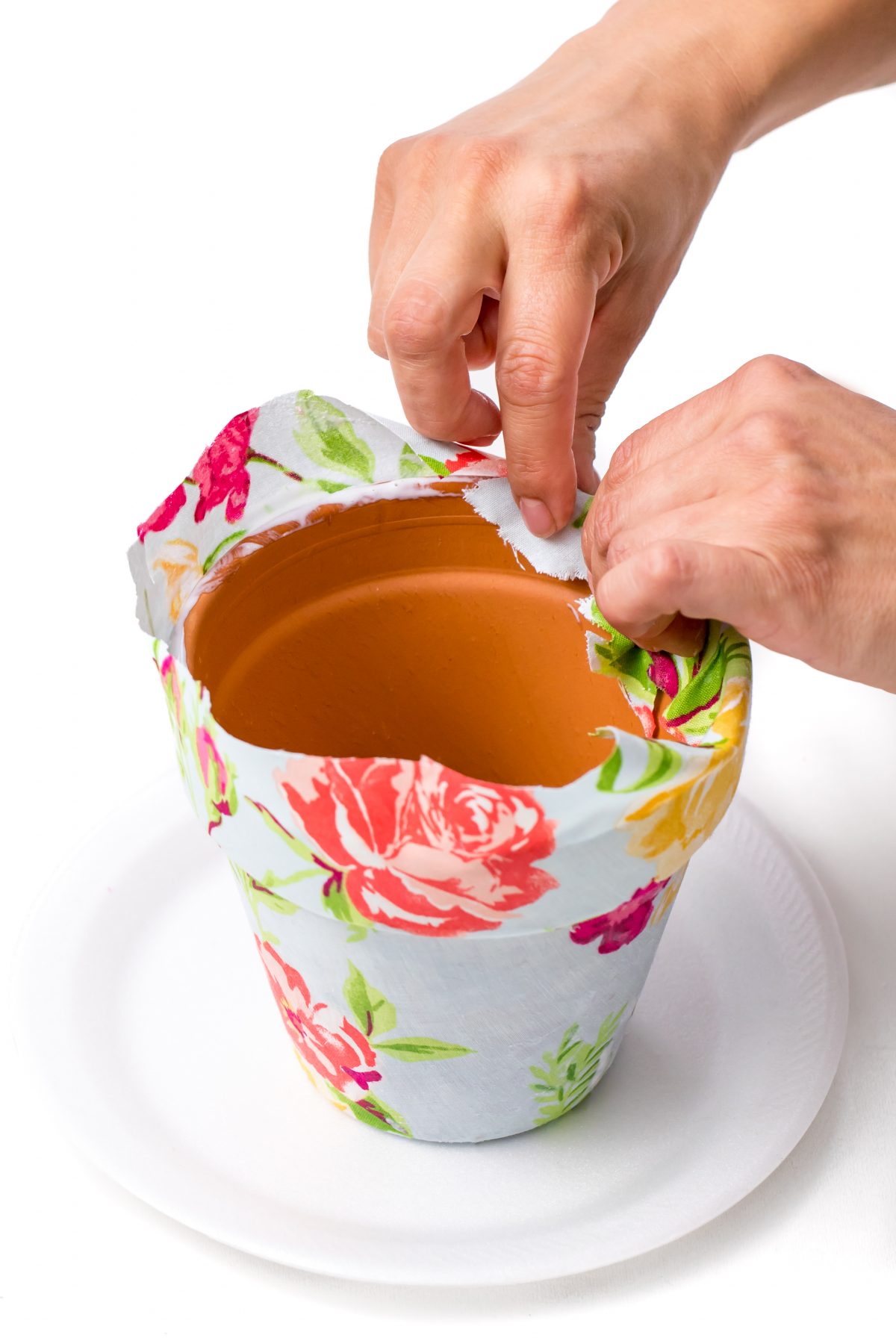Fabric Covered Flower Pot - firmly pressing fabric to inside of terracotta pot