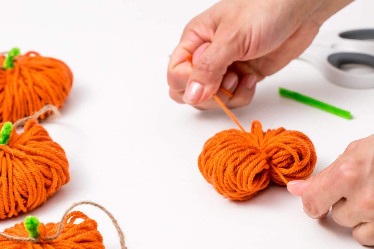Tie orange yarn tight
