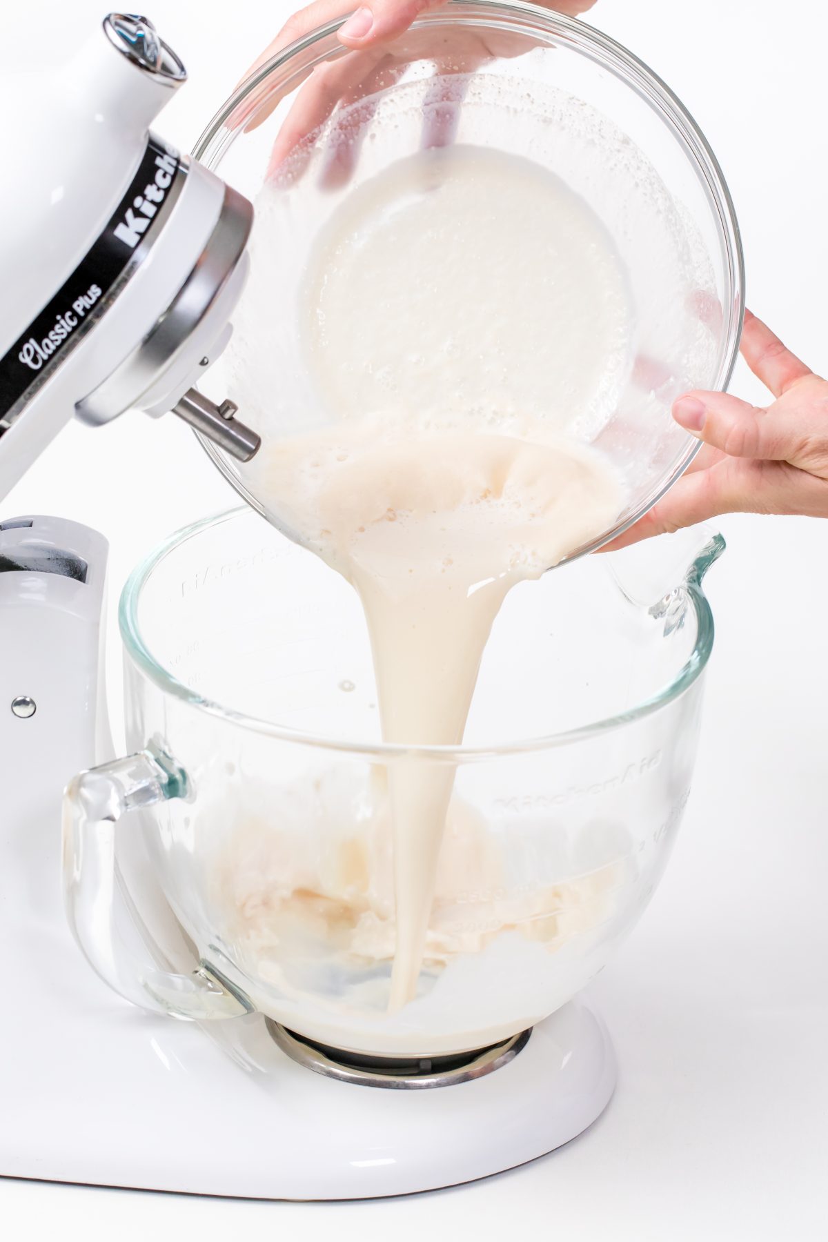 pour yeast mixture into mixing bowl