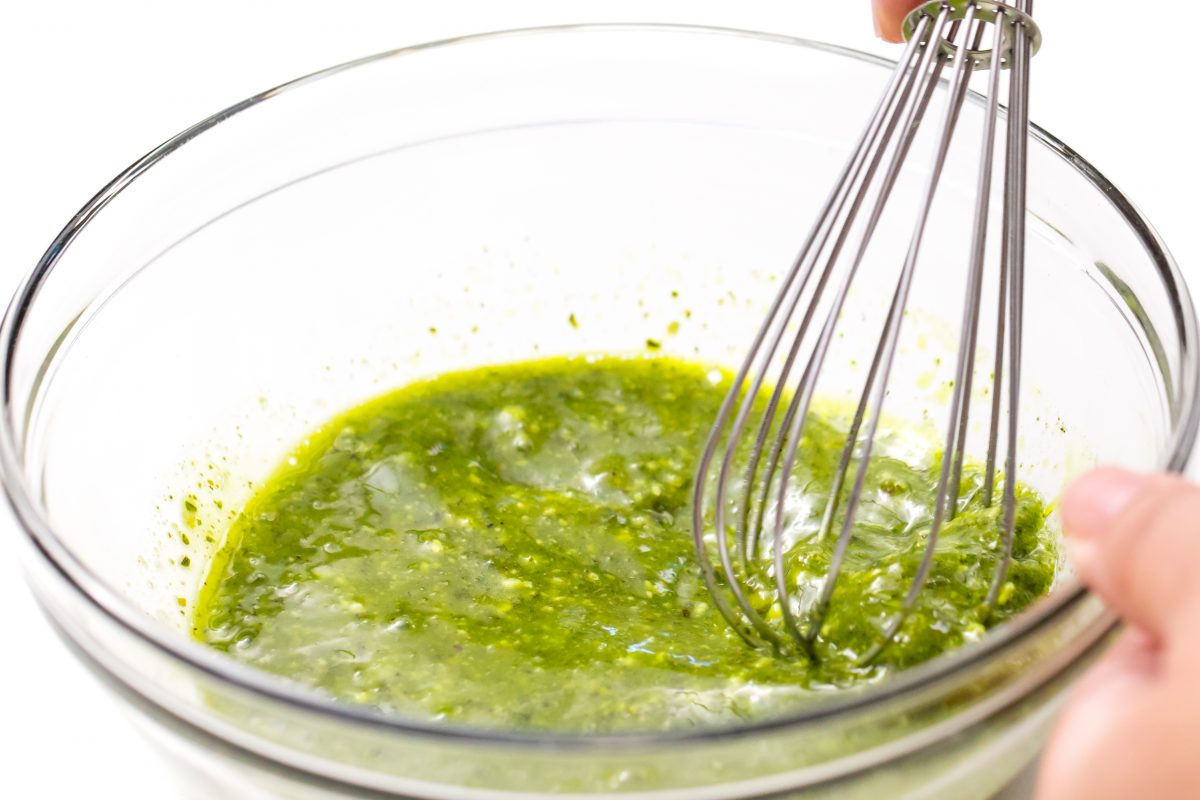 Whisk together pesto, honey and lime