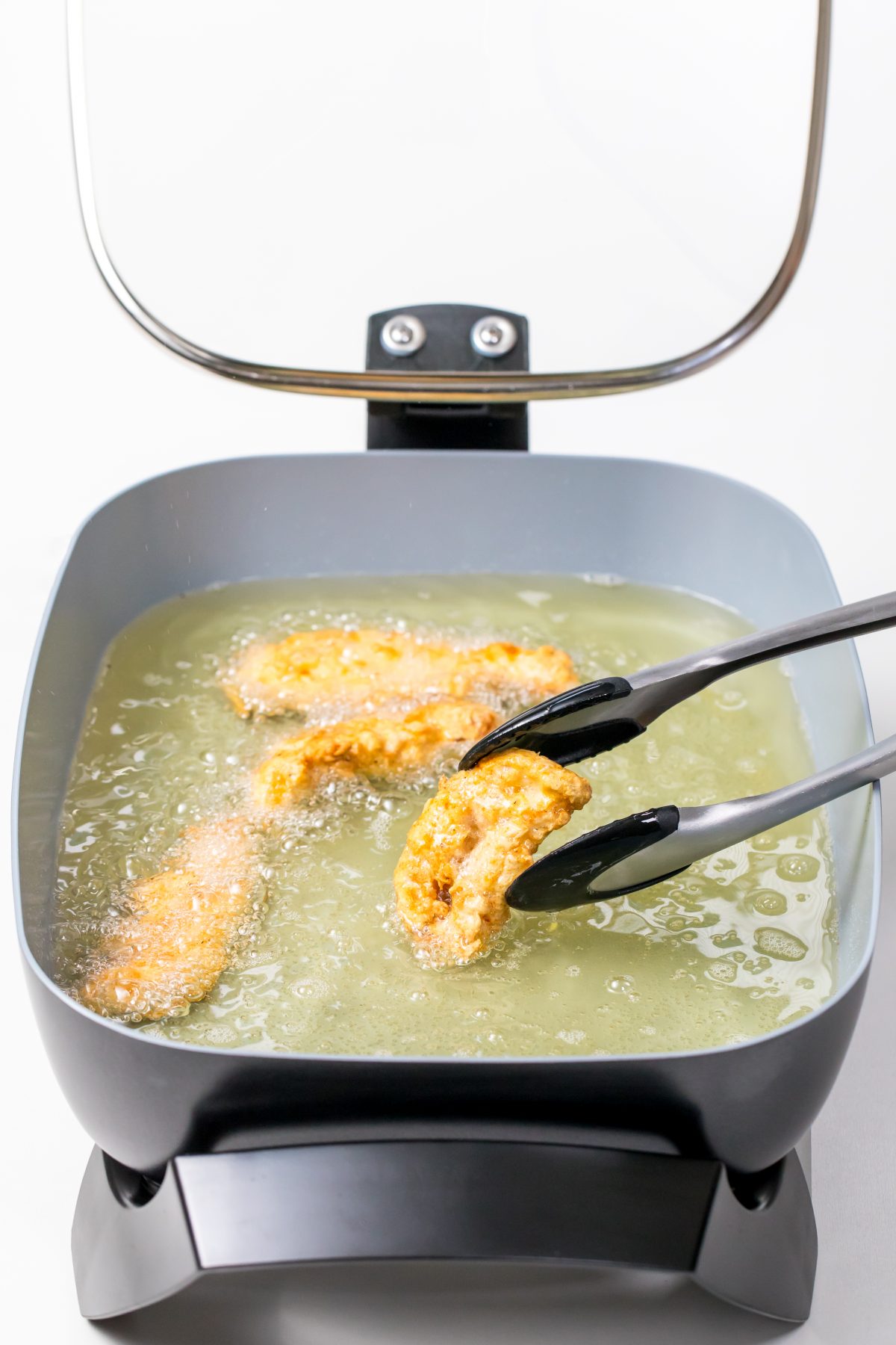 Deep-fry chicken until cooked through