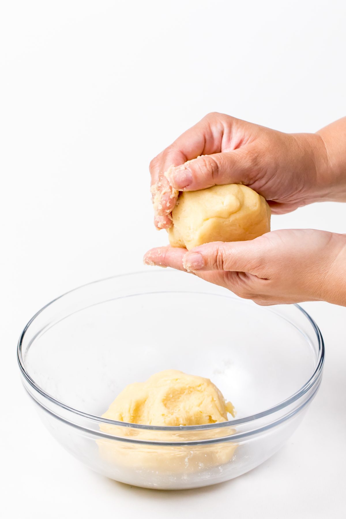 Divide dough in half with hands