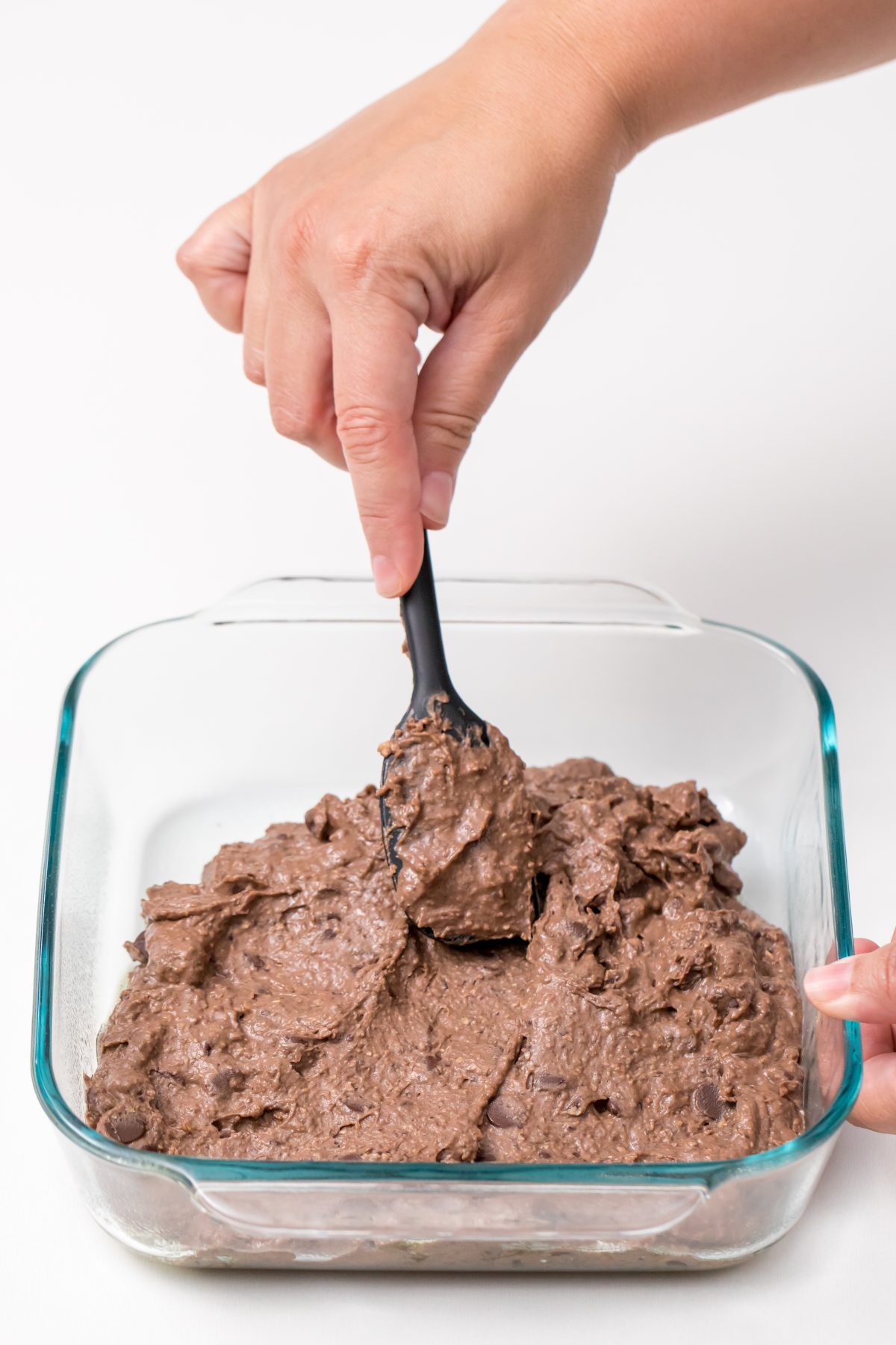 Spread brownie mixture into a greased pan