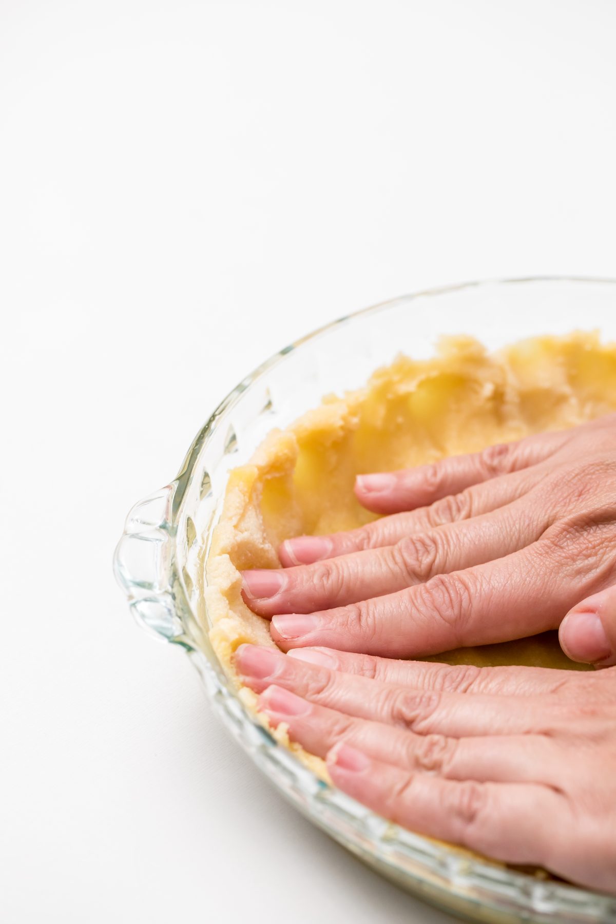 Press dough up sides of pie plate with fingers
