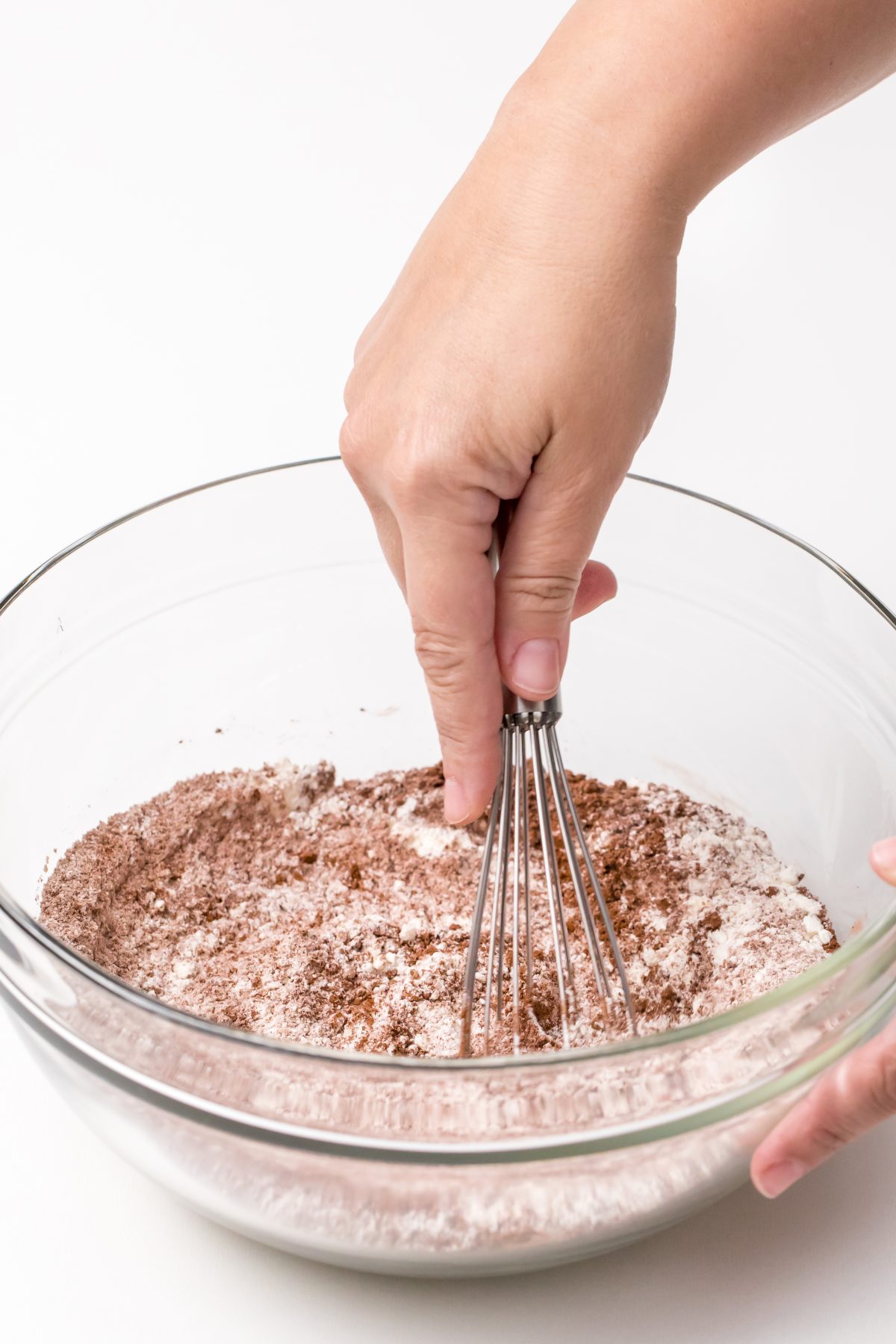 For the cake batter, gather sugar, flour, cocoa powder and vanilla extract