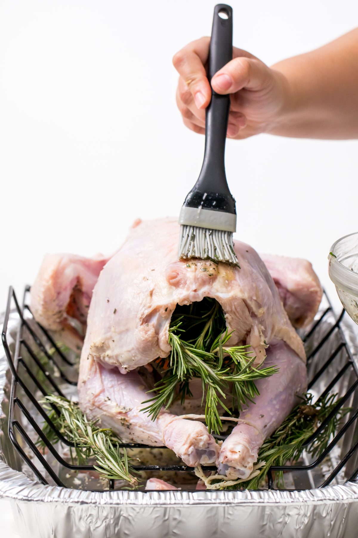 Spread butter on the backside of the turkey.