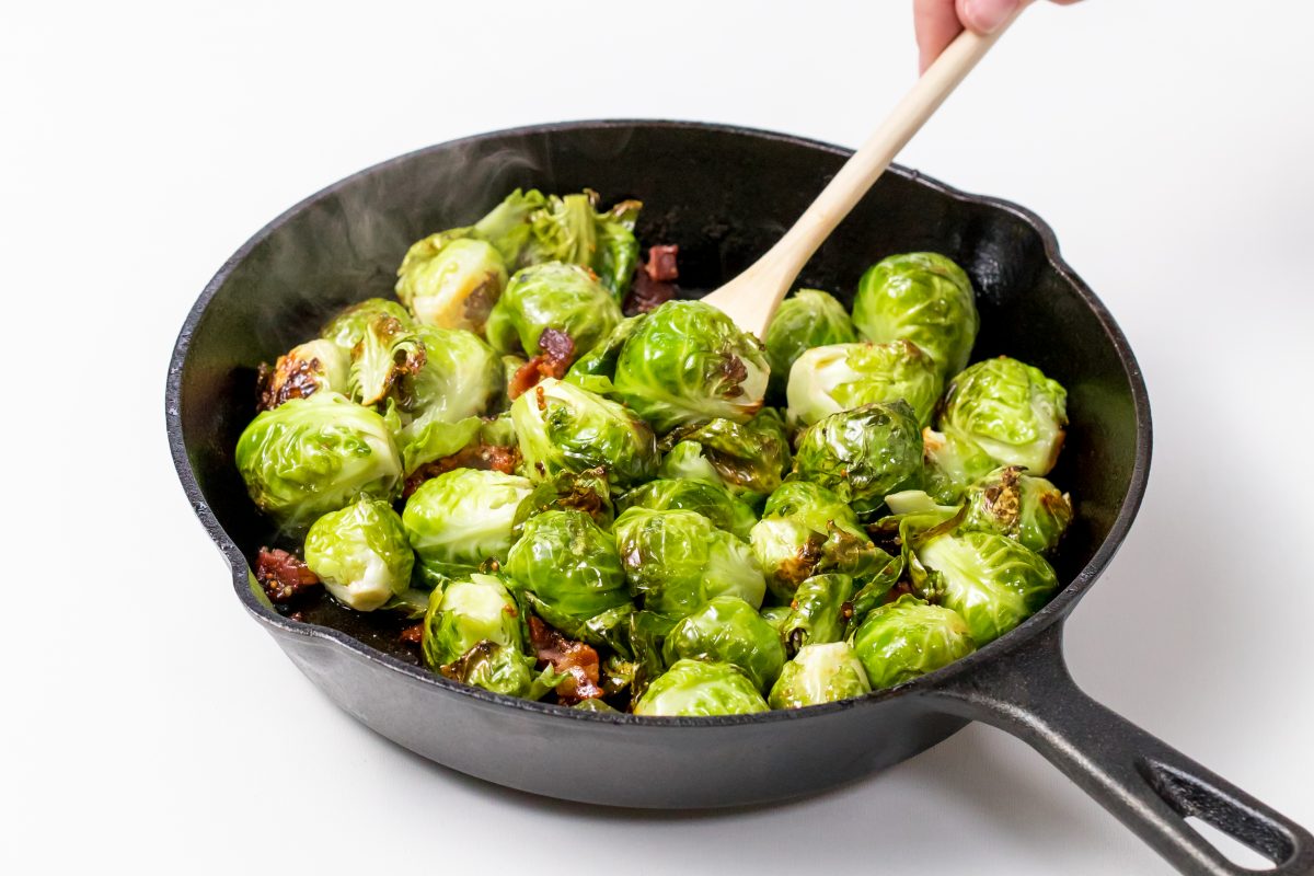 Brussels sprouts and bacon being served