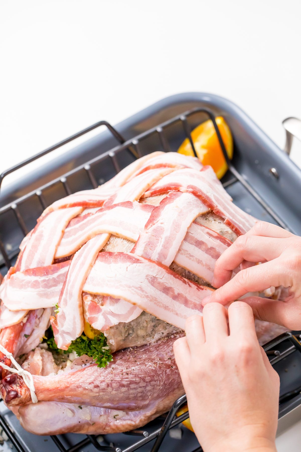 5D4B9083 - Bacon Wrapped Turkey - weaving 8 strips of bacon in a lattice pattern over the breast