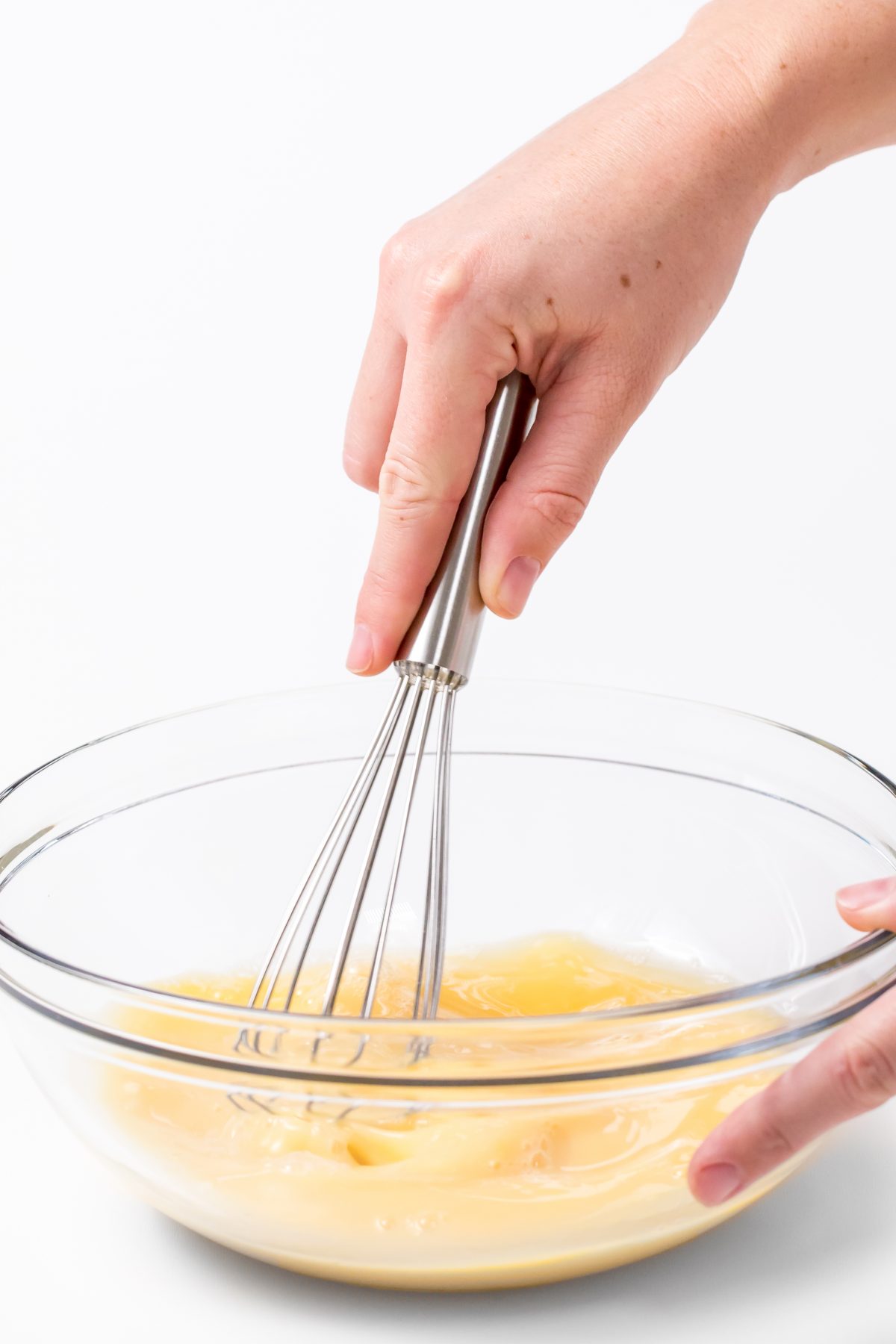 Whisk eggs and broth together