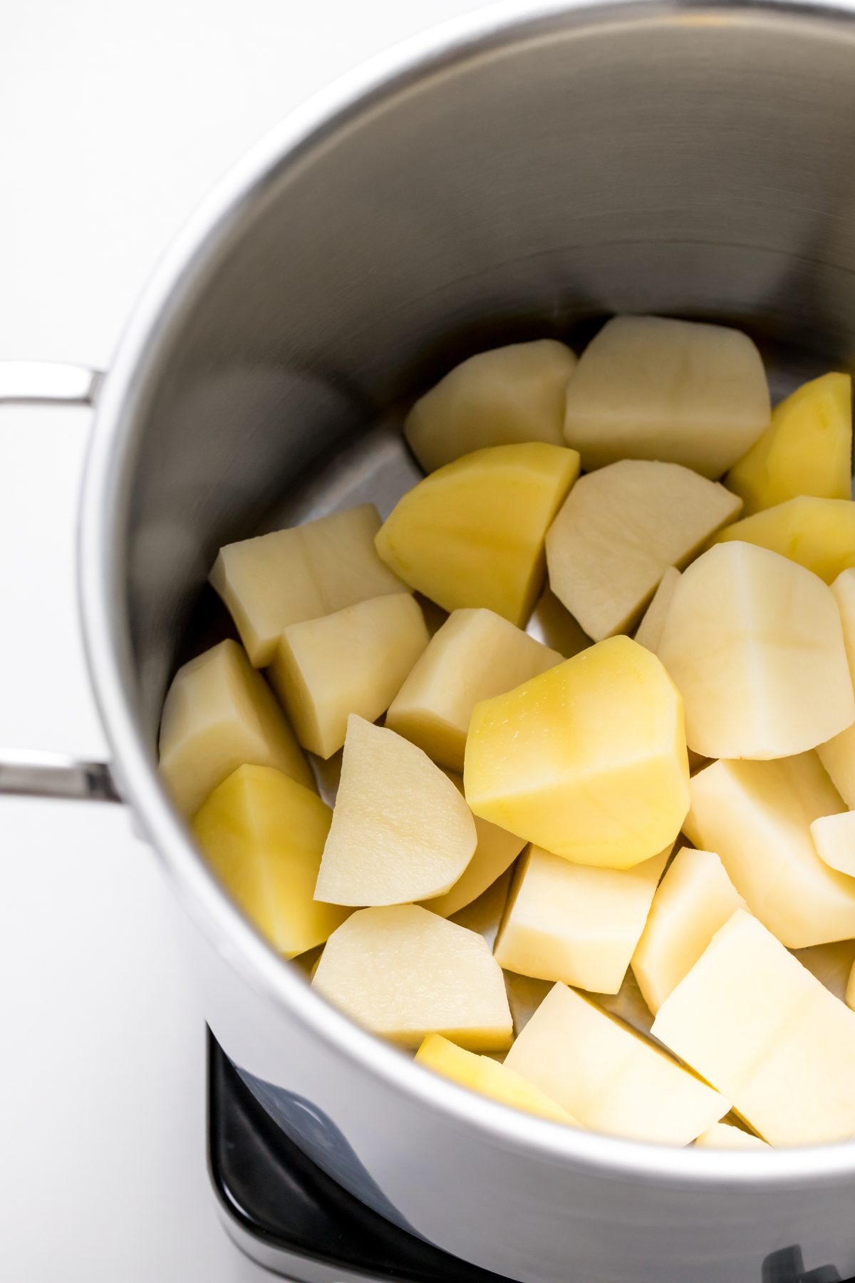 Place potato and celery root chunks and the creamy horseradish in a large stockpot