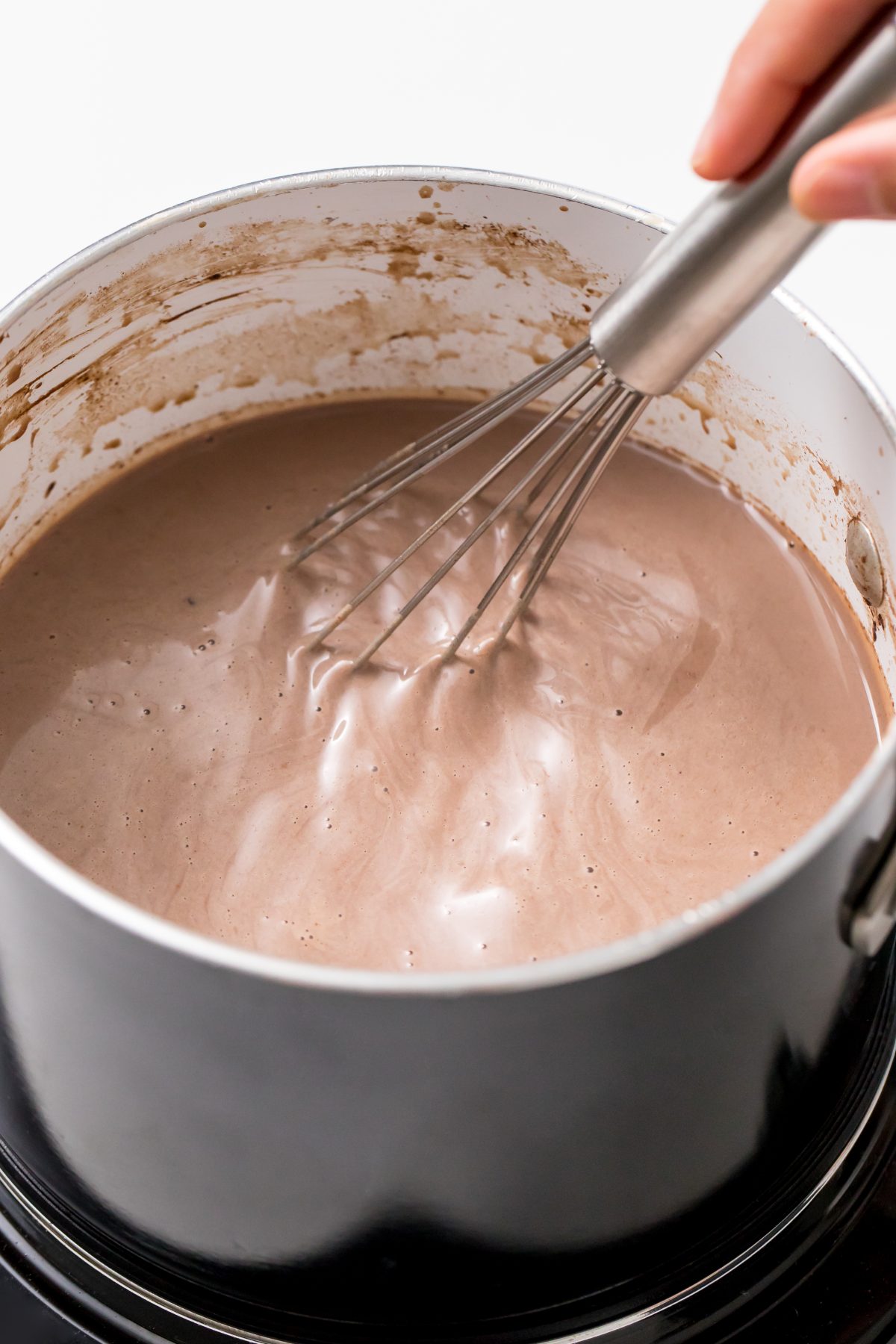 5D4B1649 - Dulce de Leche Hot Chocolate - Combine milk, cocoa powder, spices, and vanilla