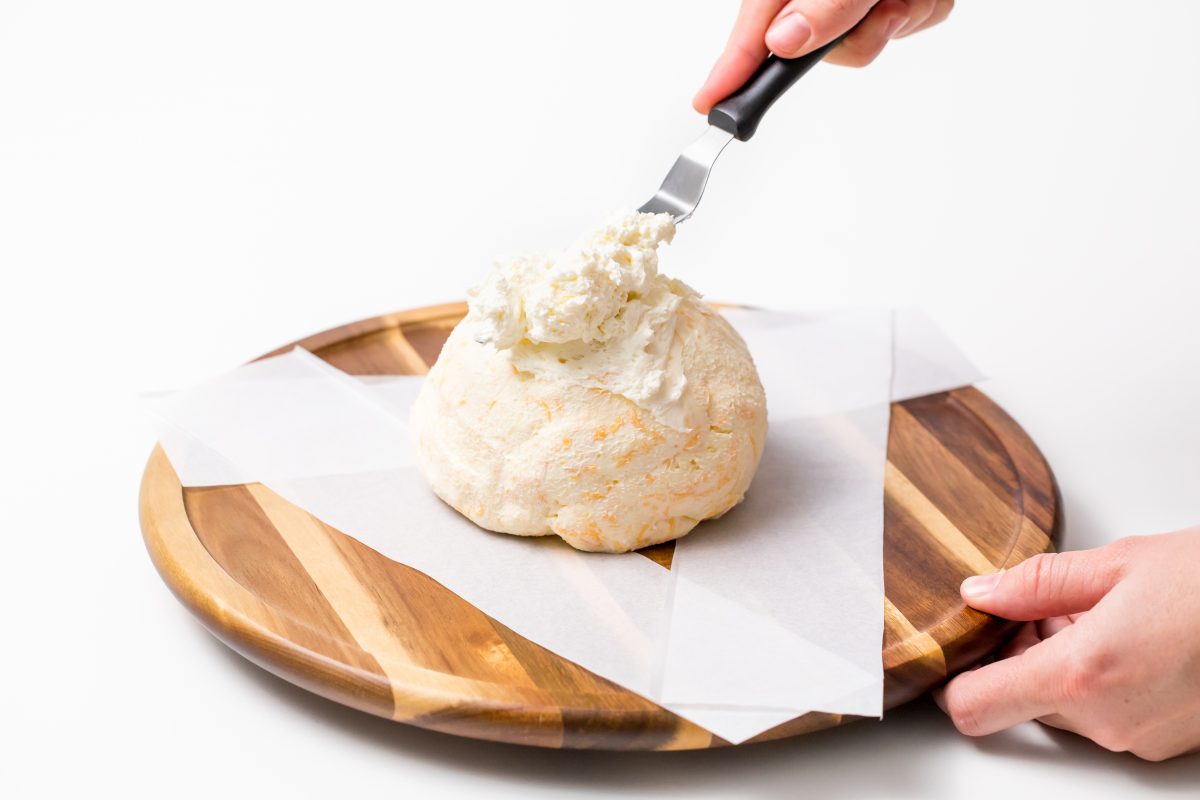 Transfer the cheese ball to a serving platter