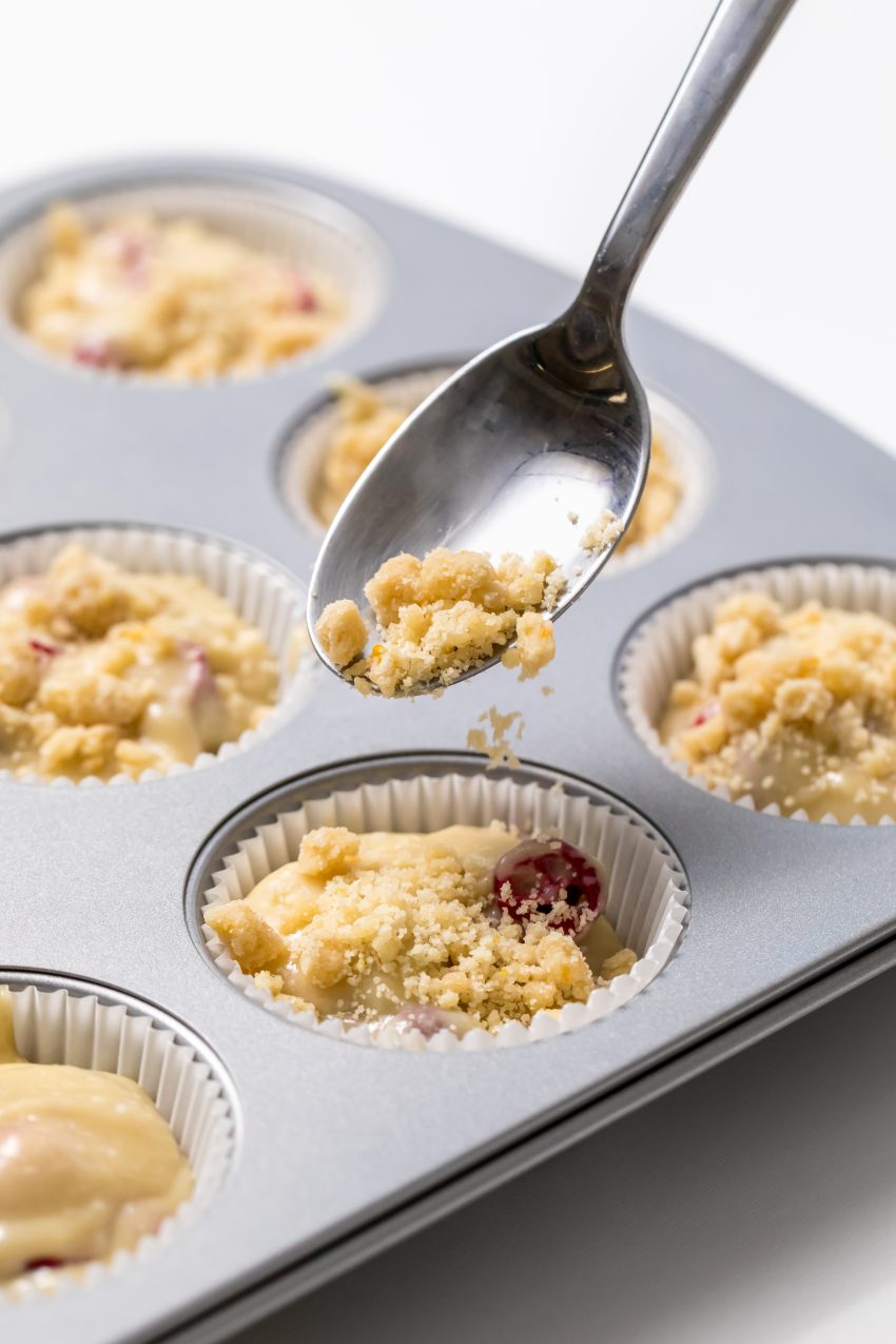 5D4B4722 - Orange Cranberry Muffins - Transfer the muffin batter to a muffin pan and top with streusel