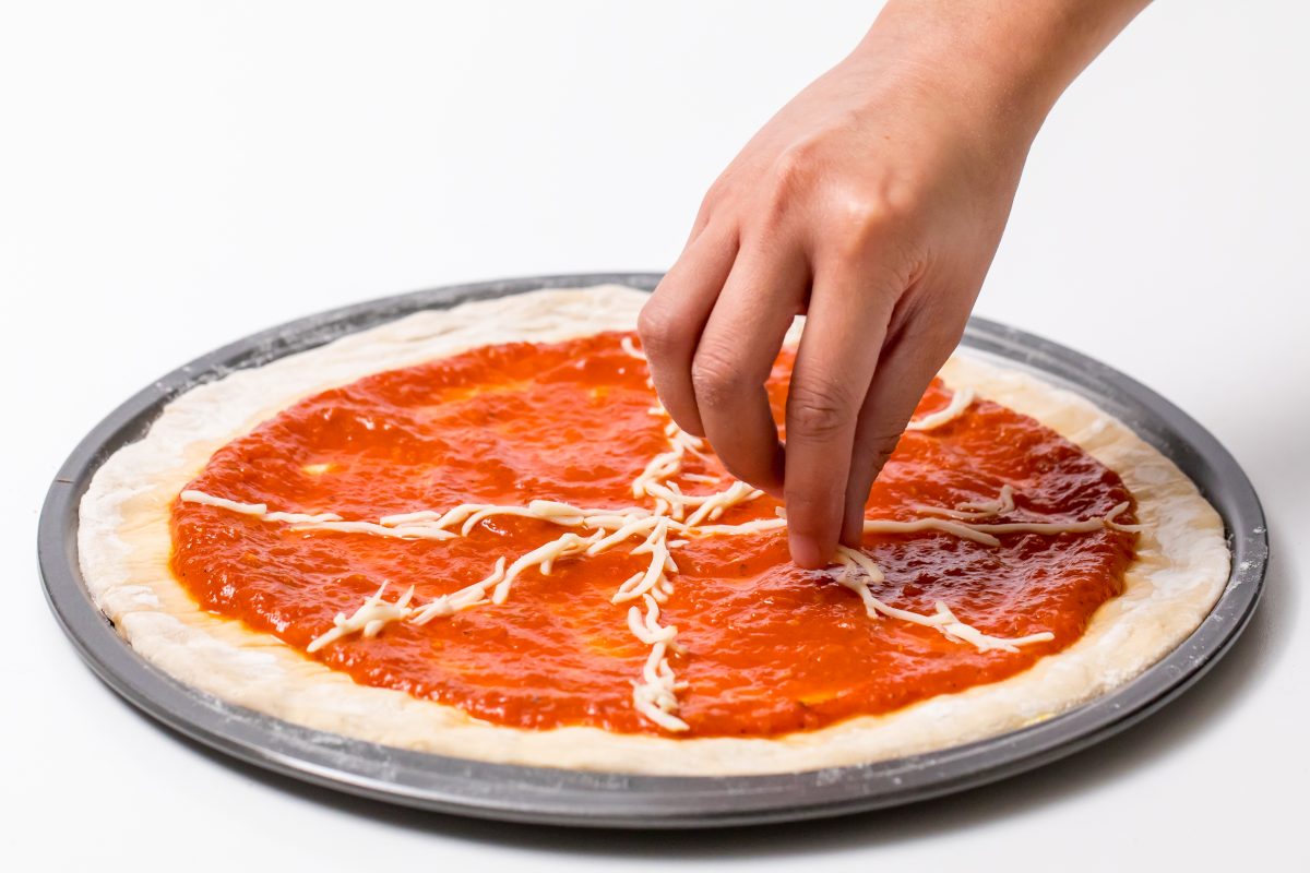 Create a web of mozzarella cheese