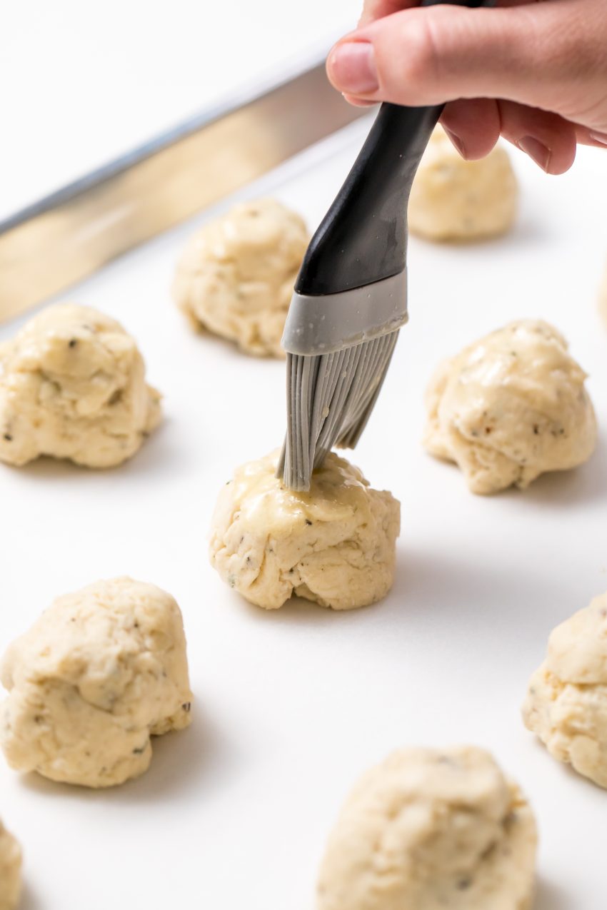 5D4B4948 - Rosemary Parmesan Drop Biscuits - Brush biscuits with butter and bake