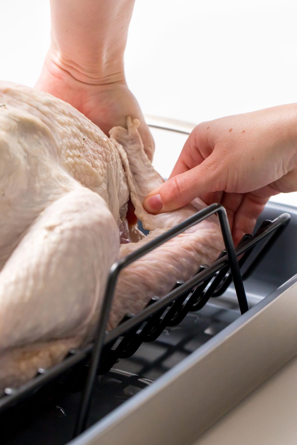 5D4B4999 - Easy No fuss Thanksgiving Turkey - applying compound butter between turkey skin and body
