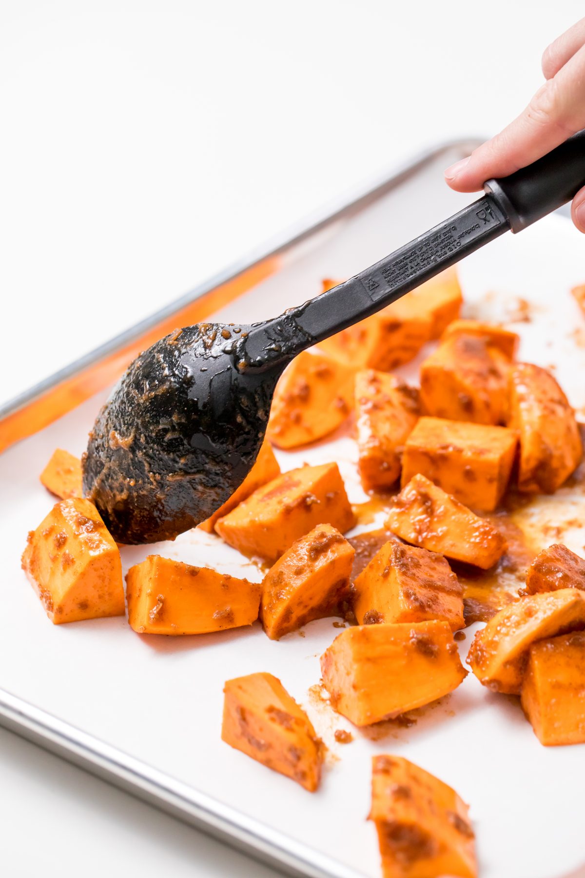 Honey cinnamon roasted sweet potatoes - Transfer the sweet potatoes to a baking sheet