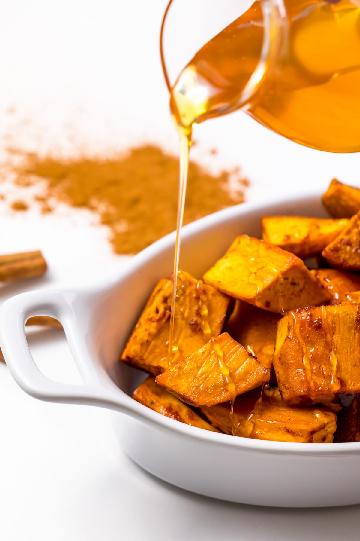 Honey cinnamon roasted sweet potatoes - Serve the sweet potatoes drizzled with honey