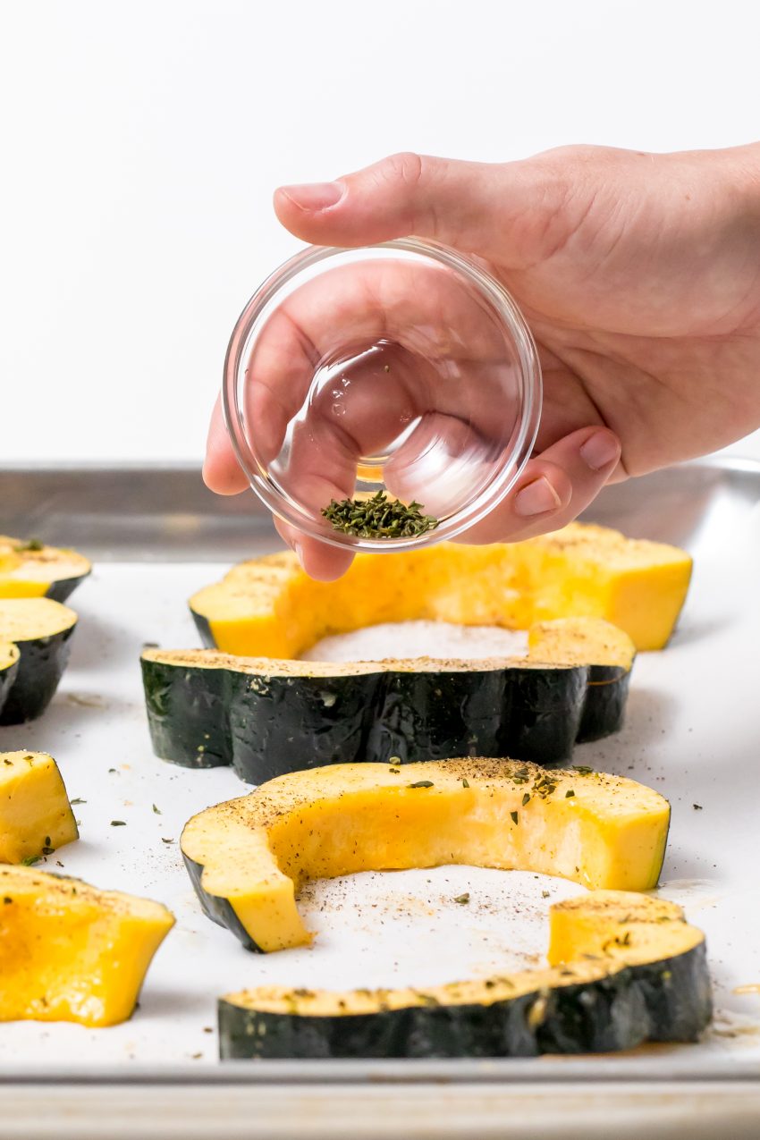5D4B8115 - Honey Butter Roasted Acorn Squash - Spread the acorn squash slices on baking sheets