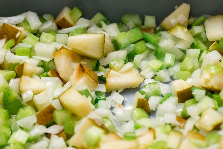 5D4B9357 - Turkey and Stuffing Casserole - Saute onions, pear, celery, and garlic in butter