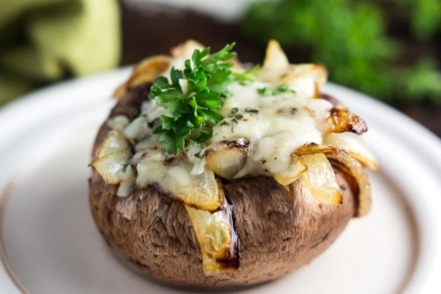 Keto-approved Friendsgiving menu caramelized onion and spinach stuffed mushrooms