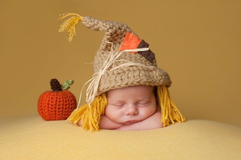 Newborn Baby Boy Wearing a Scarecrow Hat