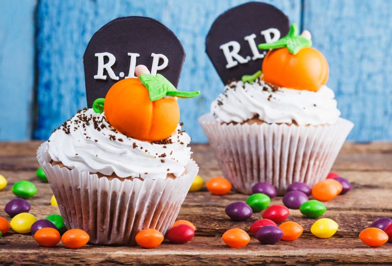 Halloween cupcakes with colored mastic decorations