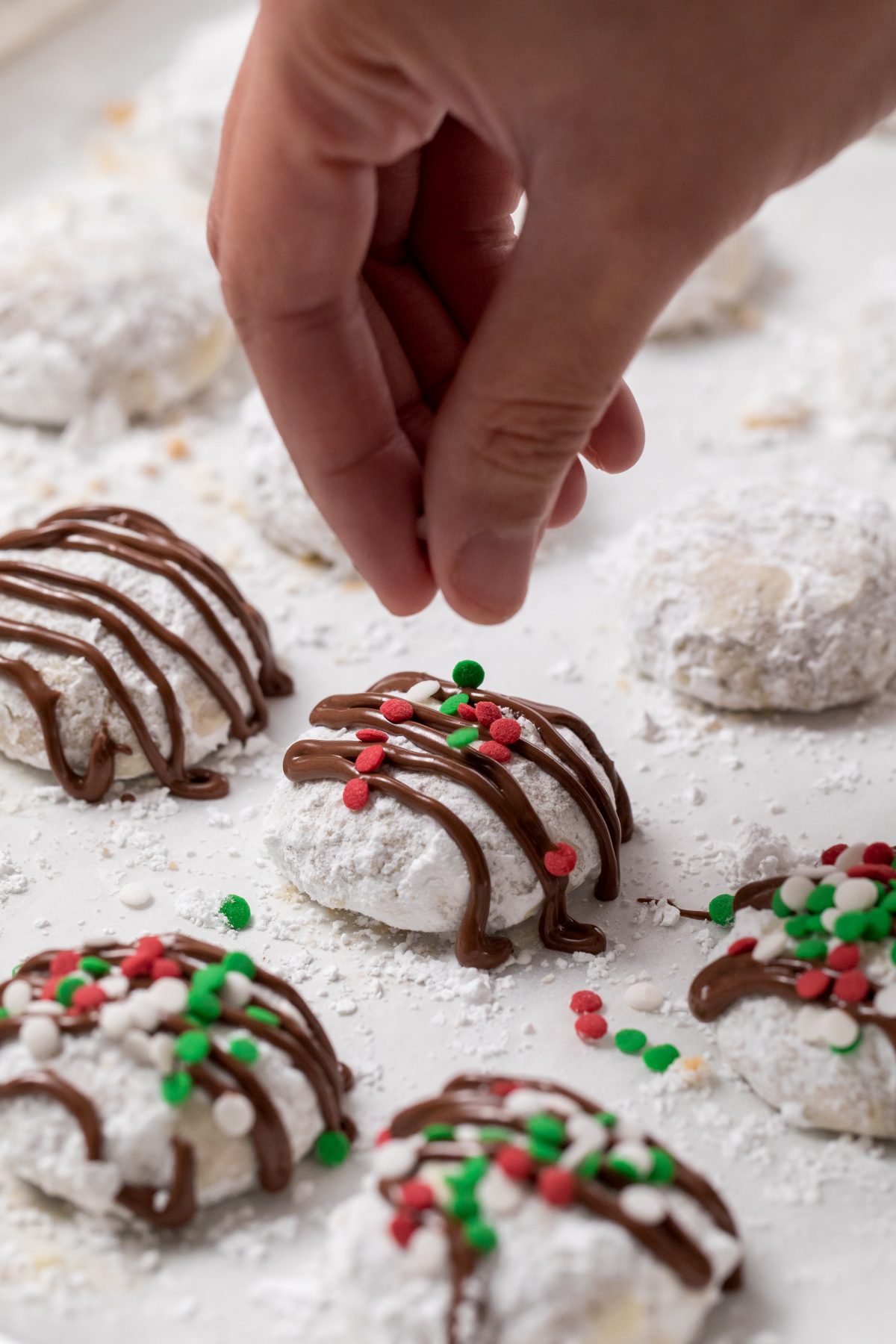 5D4B5480 - Chocolate Covered Snowball Peppermint Cookies - Decorate the snowballs
