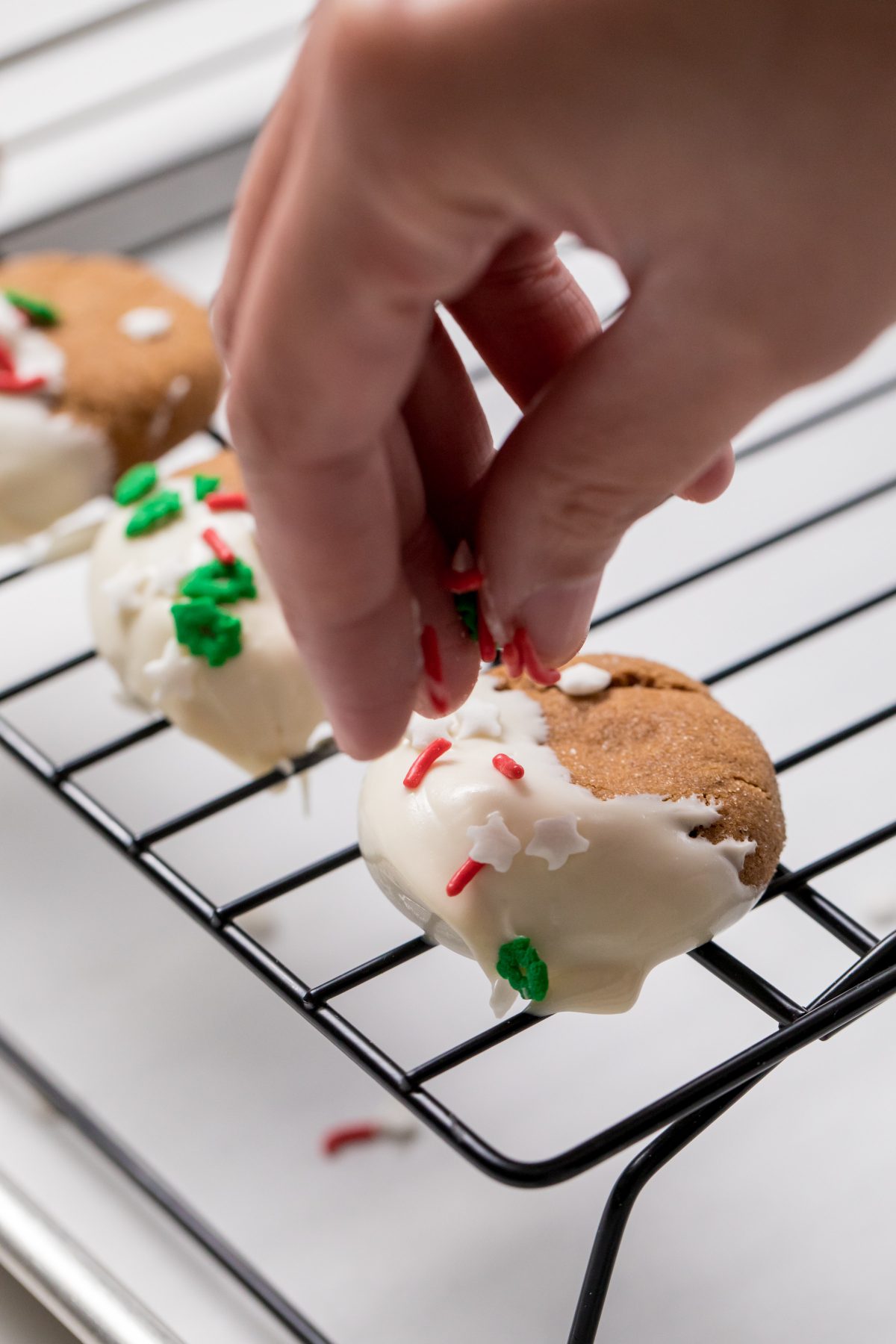 5D4B5641 - White Chocolate Dipped Gingerbread Cookies - Add sprinkles