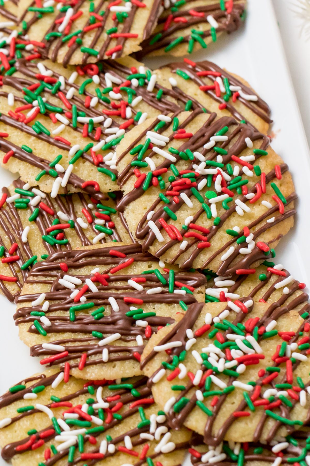5D4B6975 - Chocolate Drizzled Christmas Cookies with Holiday Jimmies